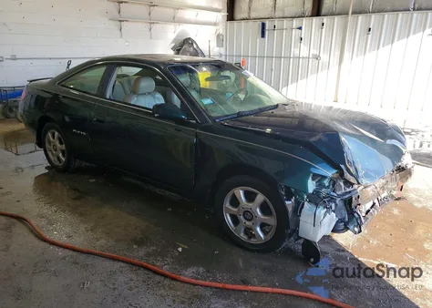 1999 Toyota Camry Solara Sle V6 z USA, uszkodzony, nr VIN 2T1CF22P5XC253588